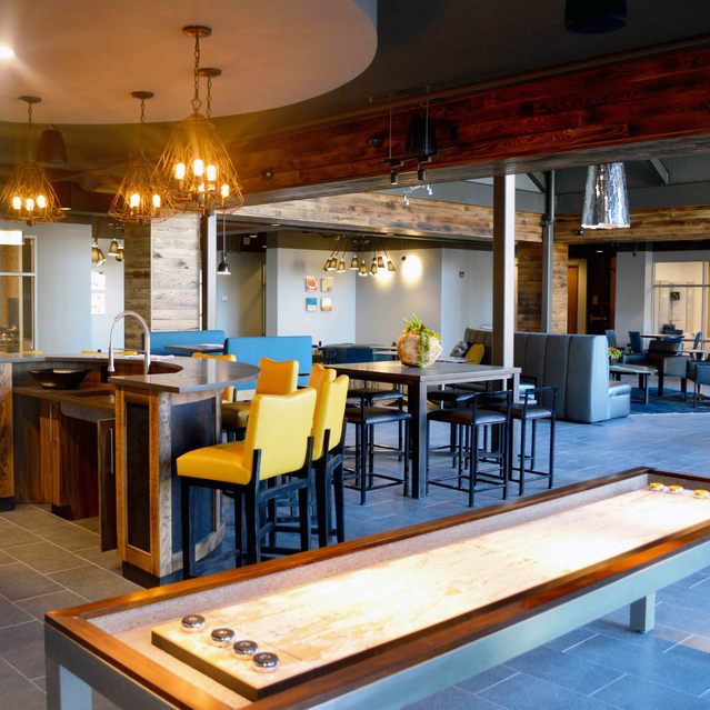 Encore at Forest Park - Community Lounge Area with Shuffleboard Table
