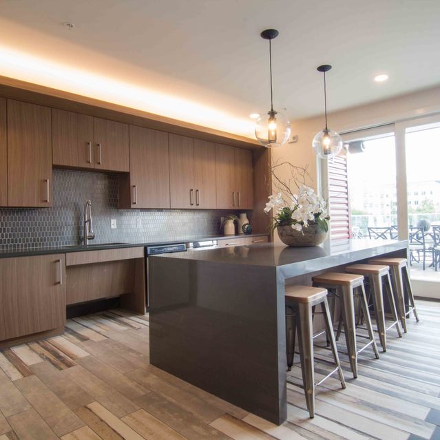 Encore at Forest Park - Kitchen Featuring Large Island With Bar Stools