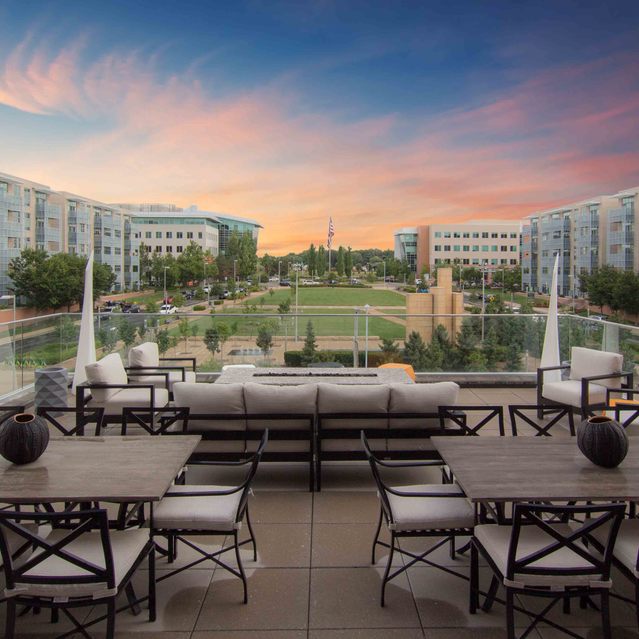 Encore at Forest Park - Rooftop Patio With Tables And Chairs